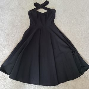 Unique Vintage cross-front halter fit-and-flair dress